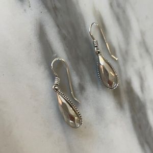 Lagos silver earrings with caviar trim.